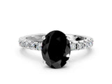 White gold Fancy Black Oval Cut Diamond Solitaire Pavé Band with Four-Prong Setting