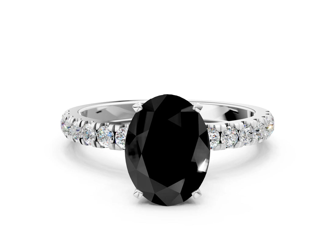 White gold Fancy Black Oval Cut Diamond Solitaire Ring with Pavé Accents and Four-Prong Setting