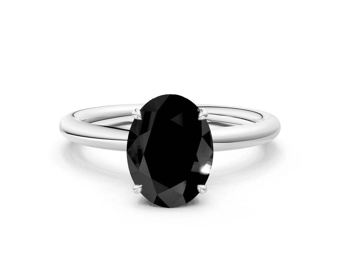 White gold Fancy Black Oval Cut Diamond Solitaire Ring with Thin Band and Four-Prong Setting