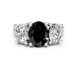 White gold Fancy Black Oval Cut Diamond Three-Stone Ring with Channel Set Band and Four-Prong Setting_24
