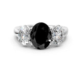 White gold Fancy Black Oval Cut Diamond Three-Stone Ring with Four-Prong Setting and Classic Band
