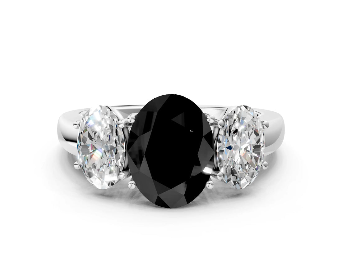White gold Fancy Black Oval Cut Diamond Three-Stone Ring with Four-Prong Setting and Classic Band