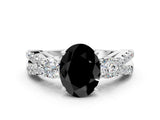 White gold Fancy Black Oval Cut Diamond Three-Stone Ring with Pavé Split Shank and Four-Prong Setting