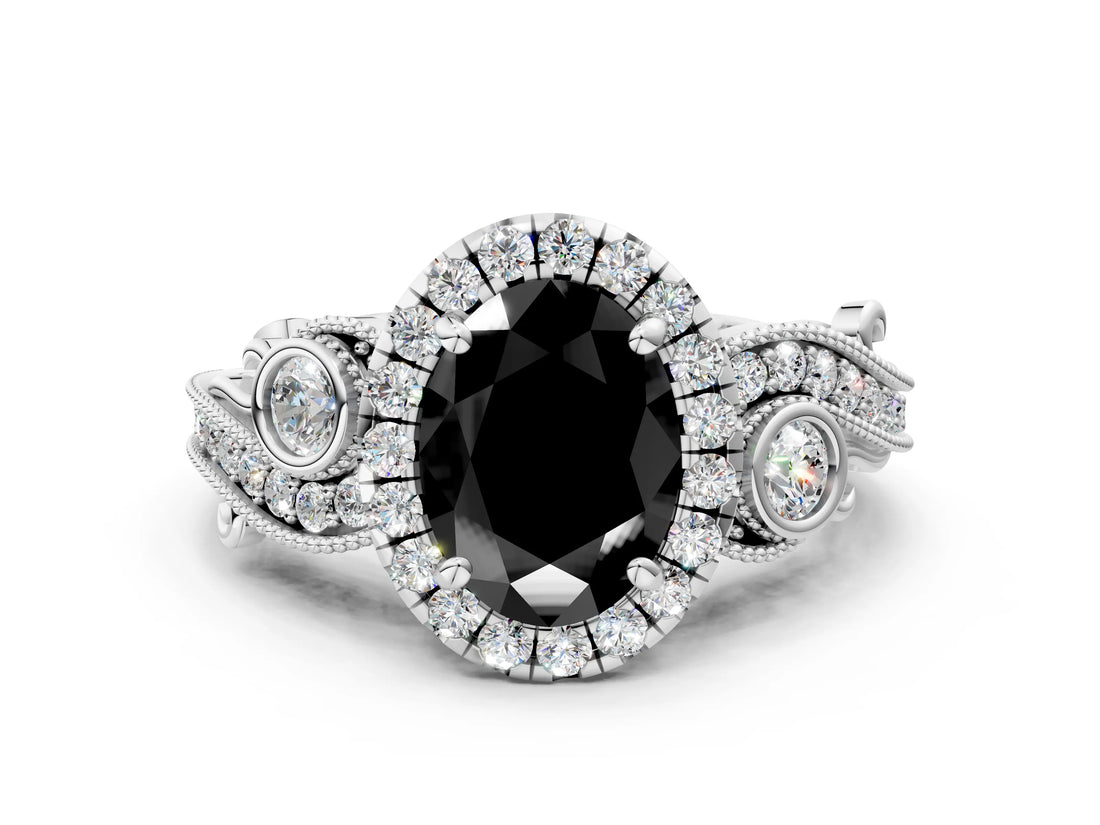 White gold Fancy Black Oval Cut Halo Diamond Ring with Milgrain and Bezel Accents on a Split Shank Band