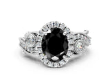 White gold Fancy Black Oval Cut Halo Diamond Ring with Milgrain and Bezel Accents on a Split Shank Band