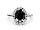 White gold Fancy Black Oval Cut Halo Round Diamond Solitaire Ring with Pavé Band and Four-Prong Setting