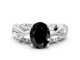 White gold Fancy Black Oval Cut Solitaire Diamond Leaf-Inspired Vine Band Ring with Prong Setting