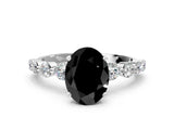 White gold Fancy Black Oval Cut Solitaire Diamond Ring with Pave Band and Four-Prong Setting