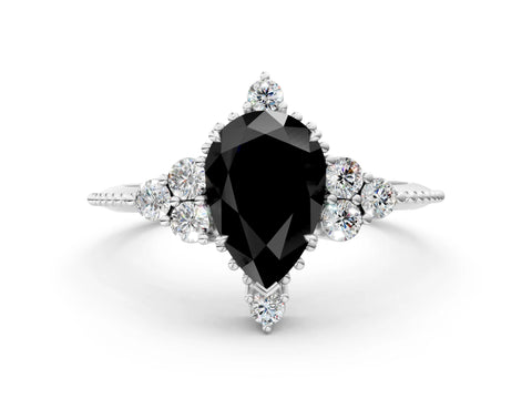 White gold Fancy Black Pear Cut Brilliant Diamond with Cluster Setting on a Beaded Band and Four-Prong Setting