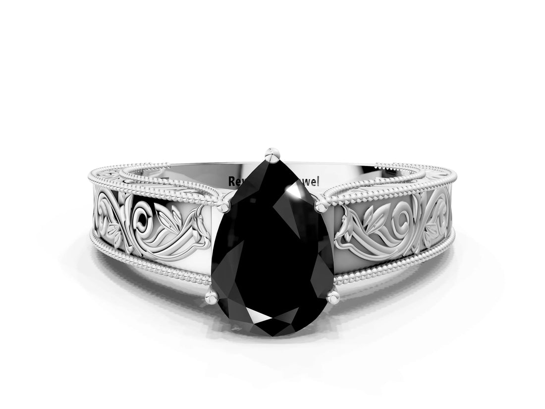 White gold Fancy Black Pear Cut Cut Solitaire Engraved Band with Four-Prong Setting