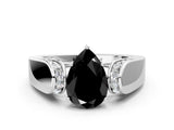 White gold Fancy Black Pear Cut Diamond Channel Set Solitaire Ring with Four-Prong Setting