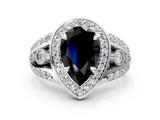 White gold Fancy Black Pear Cut Diamond Halo Ring with Split Shank and Bezel Accents and Four-Prong Setting