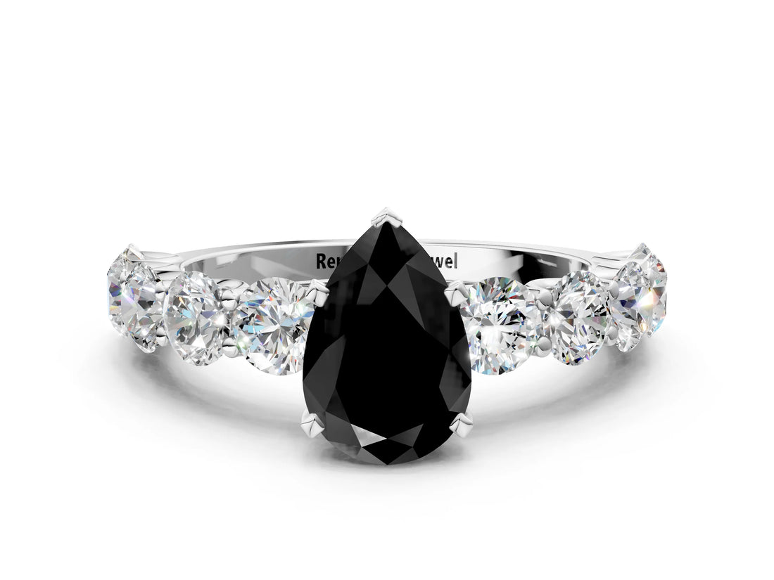 White gold Fancy Black Pear Cut Diamond Prong Setting with Side Stones on a Pave Band