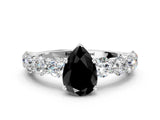 White gold Fancy Black Pear Cut Diamond Prong Setting with Side Stones on a Pave Band