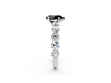 White gold Fancy Black Pear Cut Diamond Prong Setting with Side Stones on a Pave Band_2