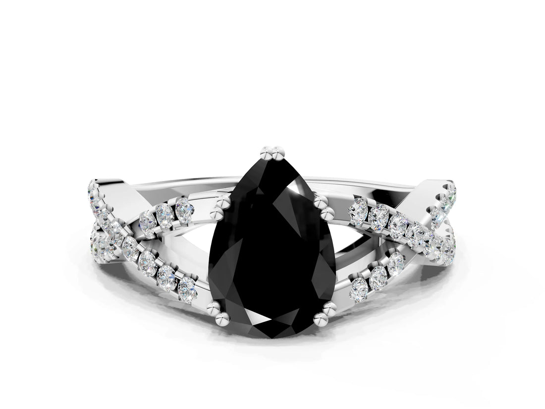 White gold Fancy Black Pear Cut Diamond Solitaire Ring with Four-Prong Setting and Twisted Pavé Band