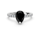 White gold Fancy Black Pear Cut Diamond Solitaire Ring with Pavé Accents and Four-Prong Setting