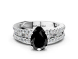 White gold Fancy Black Pear Cut Diamond Solitaire Ring with Pavé and Channel Set Band