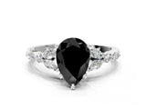 White gold Fancy Black Pear Cut Diamond Solitaire Ring with Side Stones and Four-Prong Setting_36