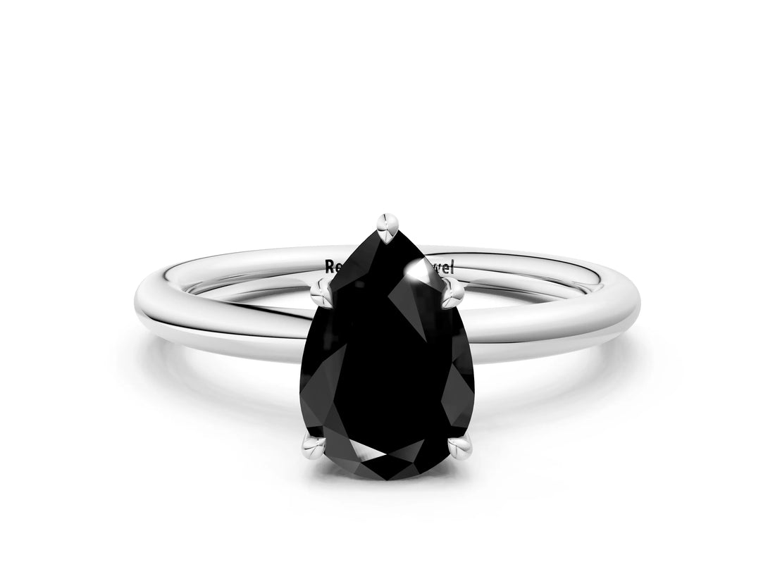 White gold Fancy Black Pear Cut Diamond Solitaire Ring with Thin Band and Four-Prong Setting