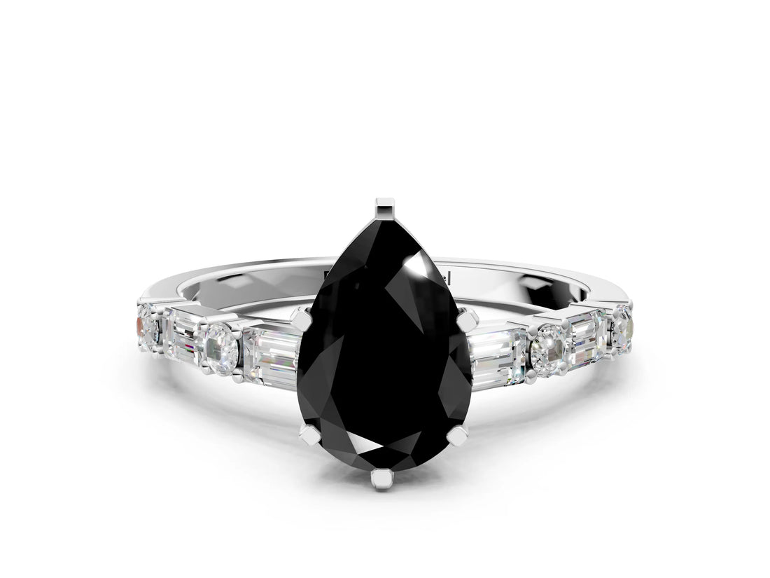 White gold Fancy Black Pear Cut Diamond Solitaire with Side Baguettes and Channel Set Band