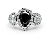 White gold Fancy Black Pear Cut Diamond Three-Stone Halo Ring with Prong Setting and Pavé Accents