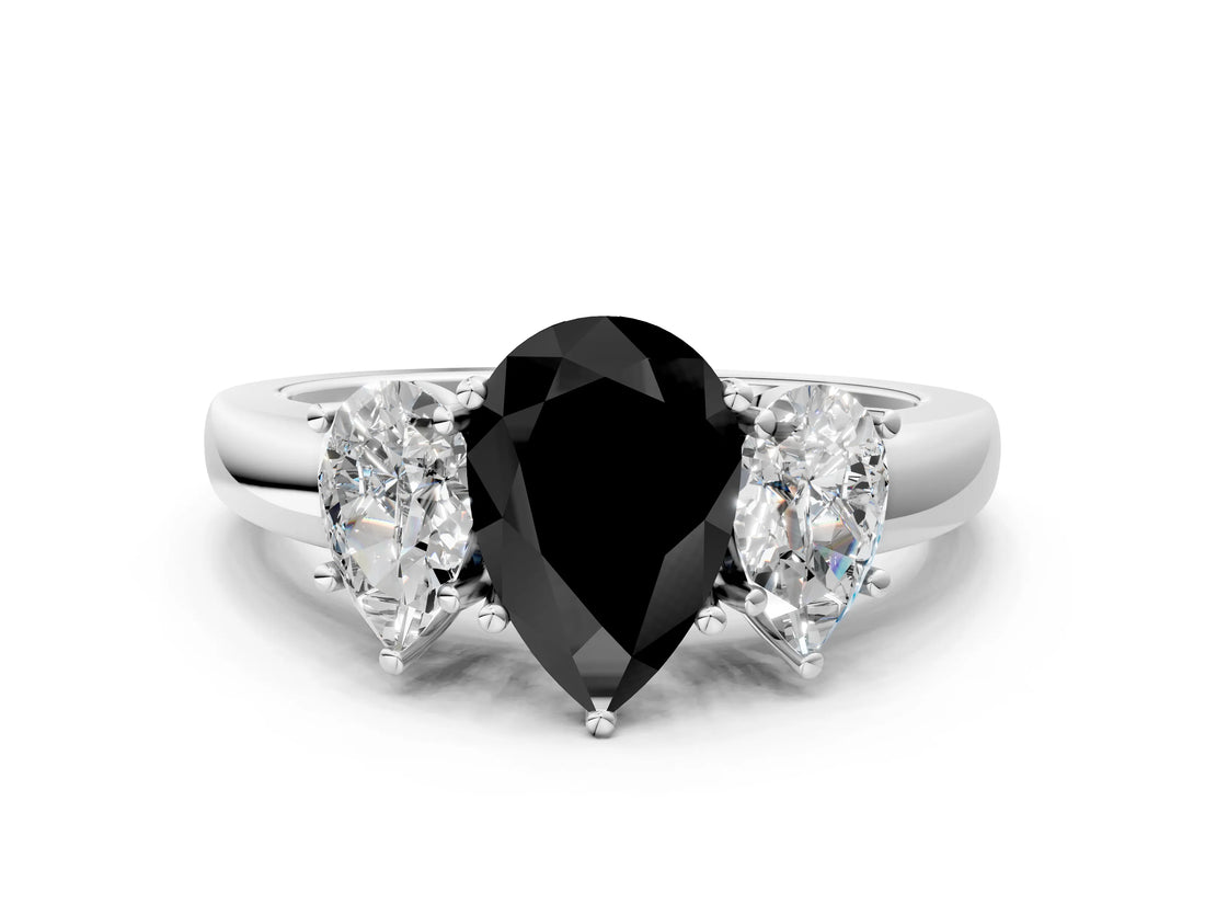 White gold Fancy Black Pear Cut Diamond Three-Stone Ring with Four-Prong Setting and Classic Band