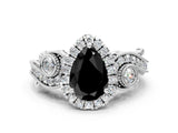 White gold Fancy Black Pear Cut Halo Diamond Ring with Milgrain and Bezel Accents on a Split Shank Band