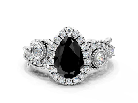 White gold Fancy Black Pear Cut Halo Diamond Ring with Milgrain and Bezel Accents on a Split Shank Band