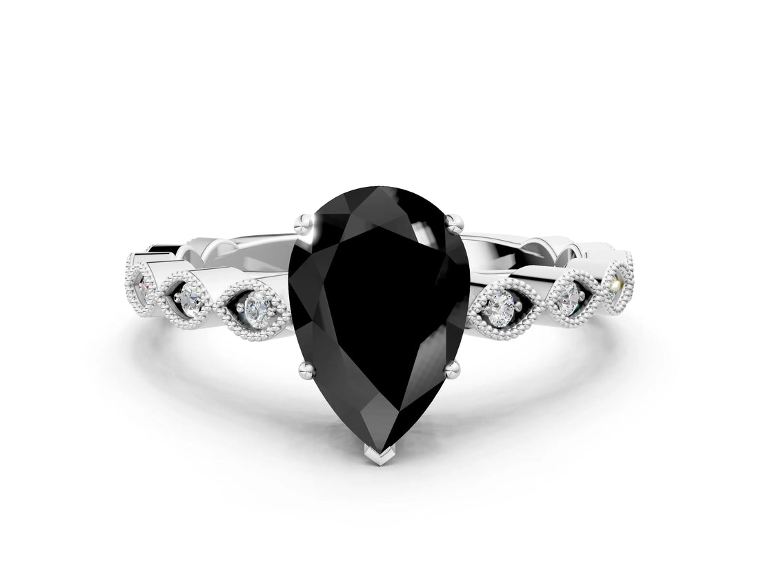 White gold Fancy Black Pear Cut Solitaire Diamond Ring with Infinity Twist Band and Four-Prong Setting