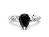 White gold Fancy Black Pear Cut Solitaire Twisted Band with Pavé Accents and Four-Prong Setting