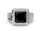 White gold Fancy Black Princess Cut Diamond Halo Ring with Split Shank and Bezel Accents and Prong Setting
