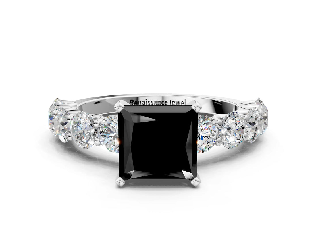 White gold Fancy Black Princess Cut Diamond Prong Setting with Side Stones on a Pave Band
