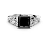 White gold Fancy Black Princess Cut Diamond Solitaire Engagement Ring with Celtic Knot Band and Four-Prong Setting