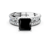 White gold Fancy Black Princess Cut Diamond Solitaire Ring with Pavé and Channel Set Band