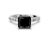 White gold Fancy Black Princess Cut Diamond Solitaire with Side Baguettes and Channel Set Band