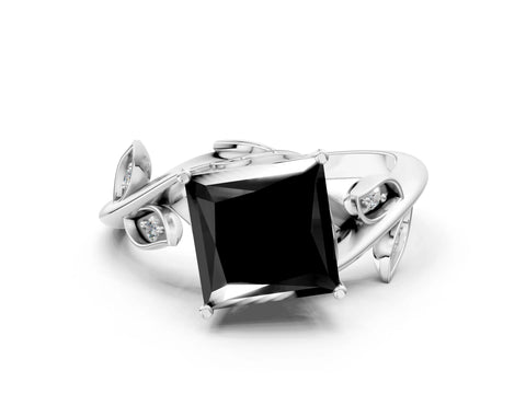White gold Fancy Black Princess Cut Solitaire Twist Engagement Ring with Leaf Accents and Prong Setting