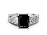 White gold Fancy Black Radiant Cut Cut Solitaire Engraved Band with Four-Prong Setting