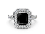 White gold Fancy Black Radiant Cut Diamond Halo Ring with Pavé Band and Prong Setting