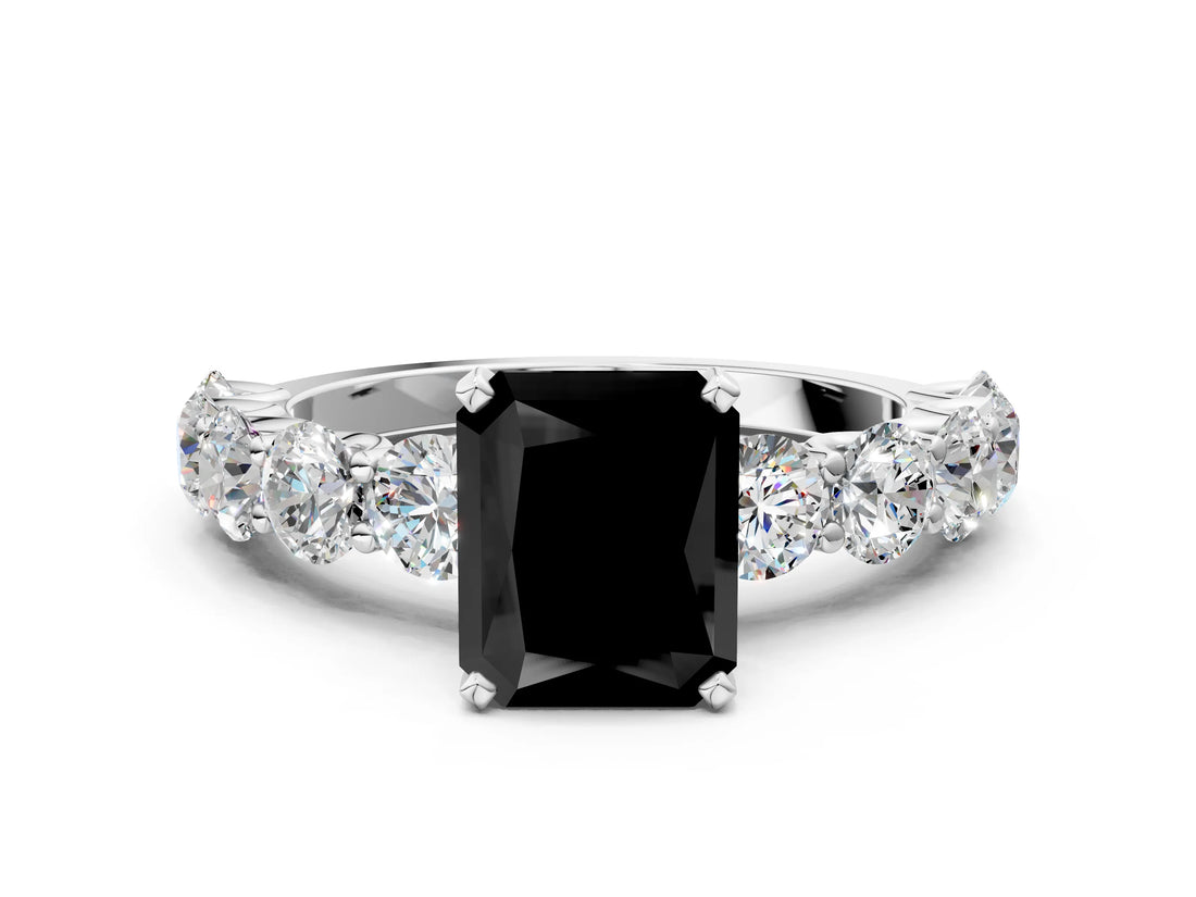White gold Fancy Black Radiant Cut Diamond Prong Setting with Side Stones on a Pave Band