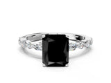White gold Fancy Black Radiant Cut Diamond Ring with Marquise and Round  Side Stones and Four-Prong Setting_60