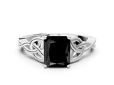 White gold Fancy Black Radiant Cut Diamond Solitaire Engagement Ring with Celtic Knot Band and Four-Prong Setting