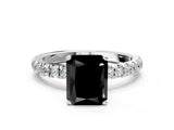 White gold Fancy Black Radiant Cut Diamond Solitaire Ring with Pavé Accents and Four-Prong Setting