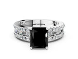 White gold Fancy Black Radiant Cut Diamond Solitaire Ring with Pavé and Channel Set Band