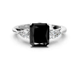 White gold Fancy Black Radiant Cut Diamond Three-Stone Ring with Pear  Side Stones and Prong Setting_60
