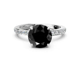 White gold Fancy Black Round Cut Brilliant Pavé Band Solitaire with Four-Prong Setting