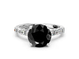 White gold Fancy Black Round Cut Diamond Solitaire with Side Baguettes and Channel Set Band