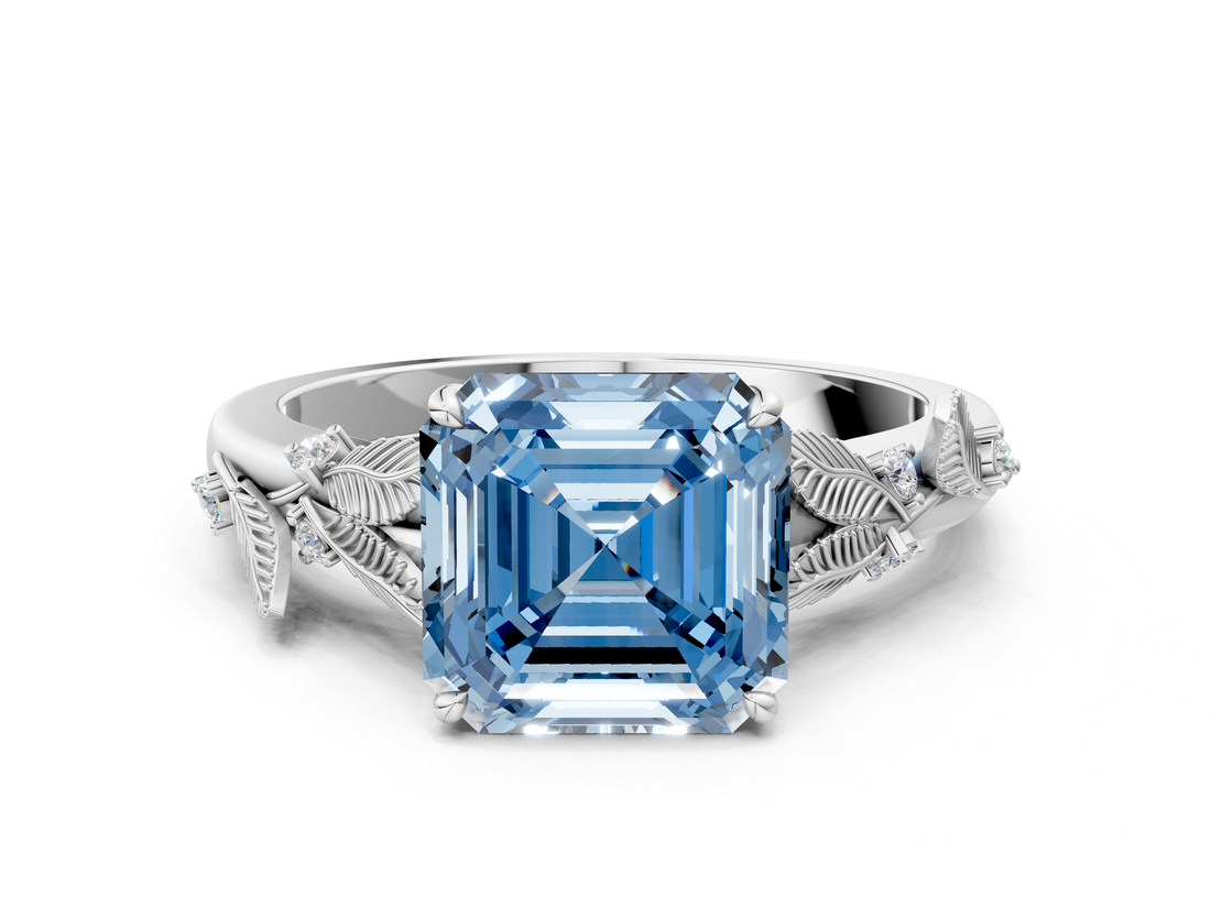 White gold Fancy Blue Asscher  Brilliant Solitaire with Leaf Motif Band and Four-Prong Setting