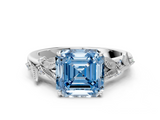 White gold Fancy Blue Asscher  Brilliant Solitaire with Leaf Motif Band and Four-Prong Setting