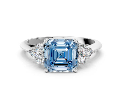 White gold Fancy Blue Asscher Cut Cut Diamond Cluster Ring with Solitaire Band and Four-Prong Setting